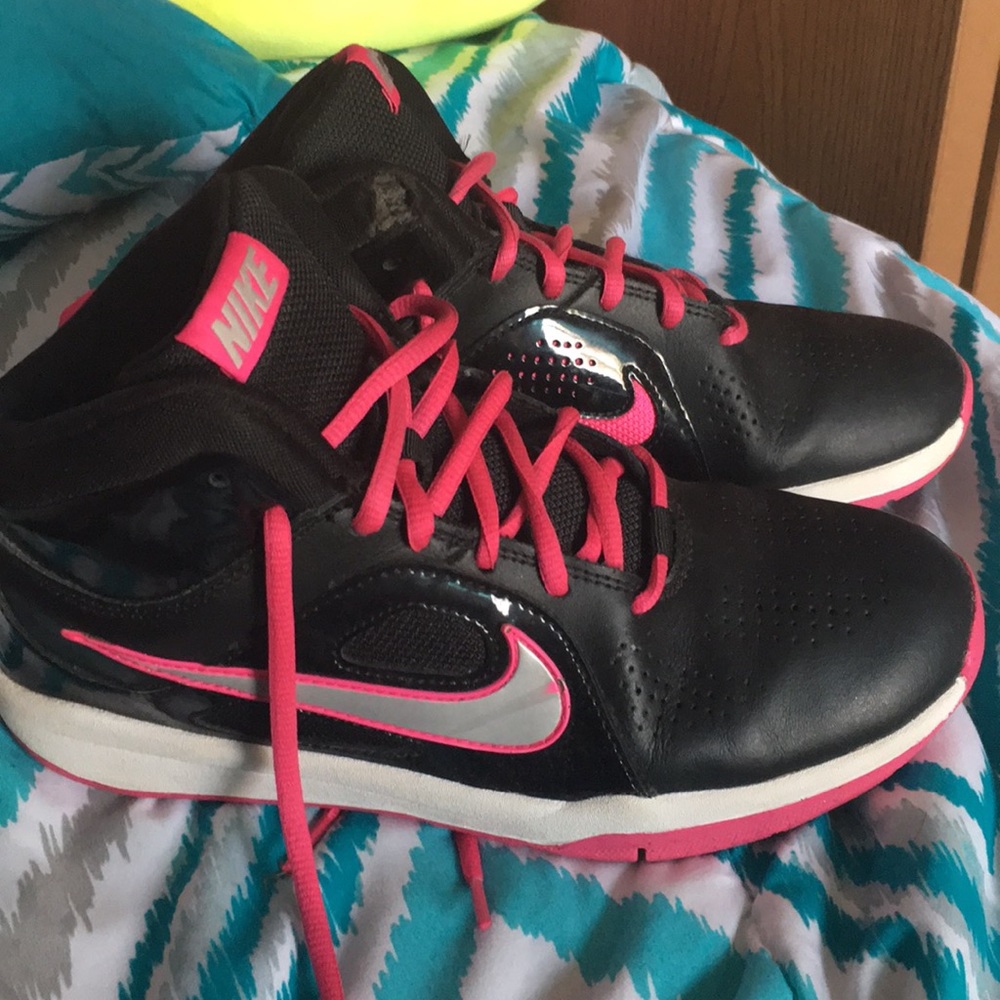 Black and pink Nike basketball shoes